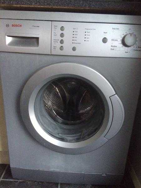 8 year old silver Bosch washing machine