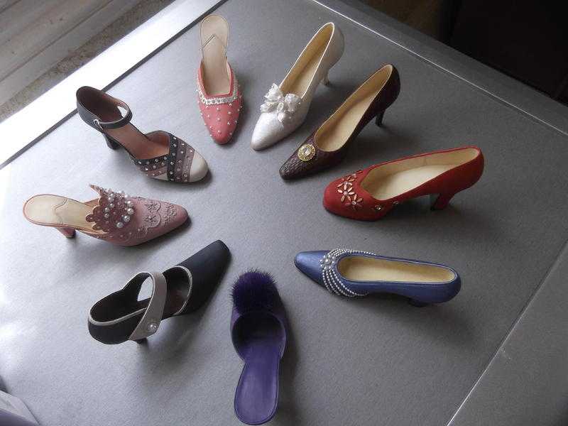 9 collectable miniature shoes from the If The Shoe Fits Collection - As New condition