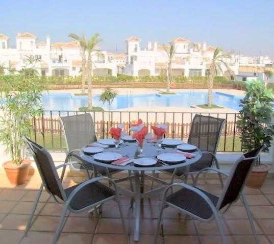 A 2 BEDROOM 2 BATHROOM FAMILY HOLIDAY VILLA TO RENT THAT OVERLOOKS GARDENS AND POOL IN.MURCIA SPAIN