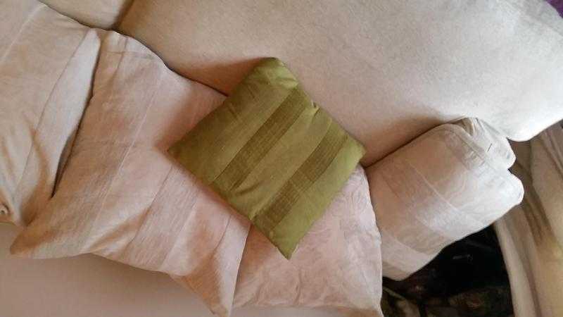 A 4 seater, cream coloured, scattr cushion back, DFS sofa