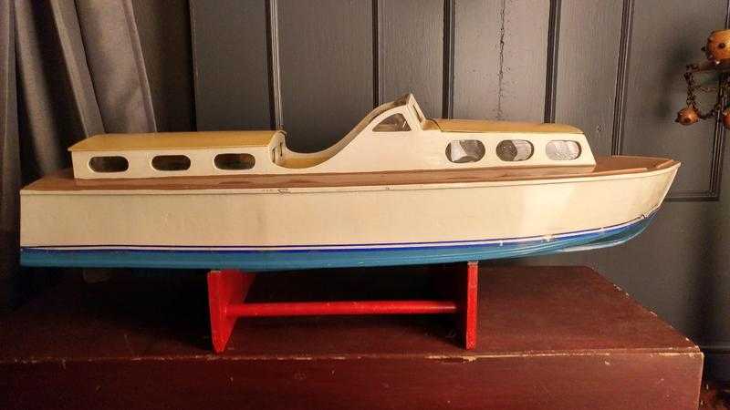 A lovely vintage wooden boat for display or use