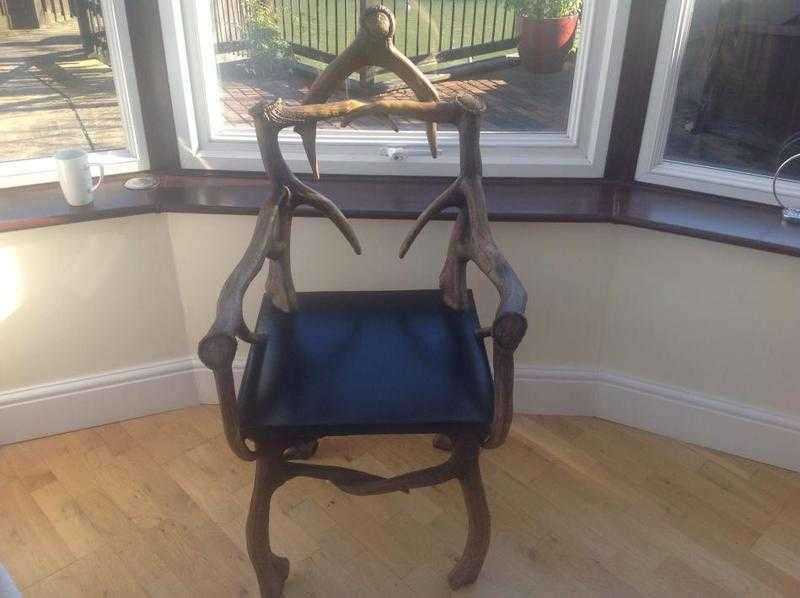 A pair of bespoke antler effect chairs