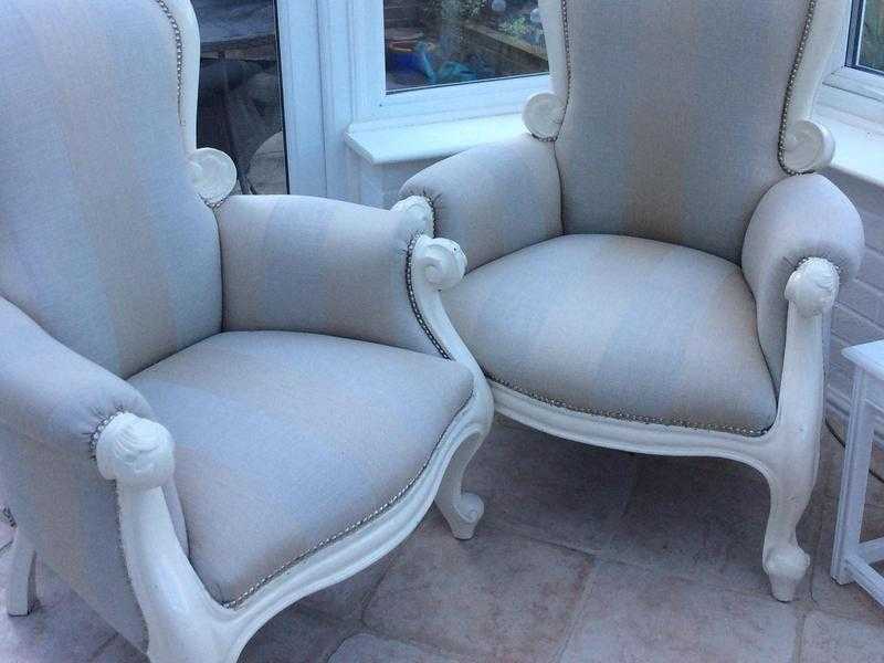 A pair of Victorian Spoonback Armchairs