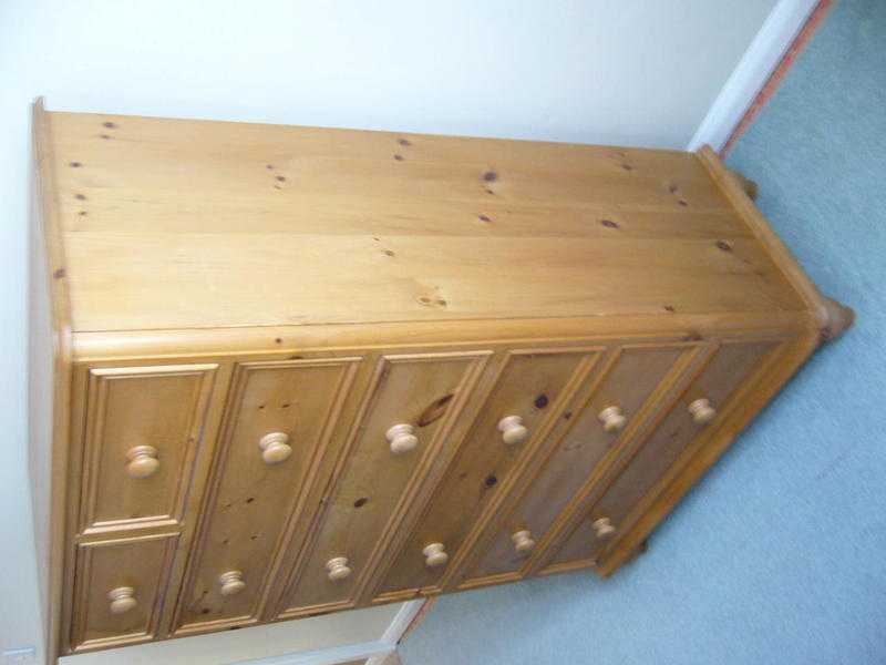 A set of 4 pine chests of drawers