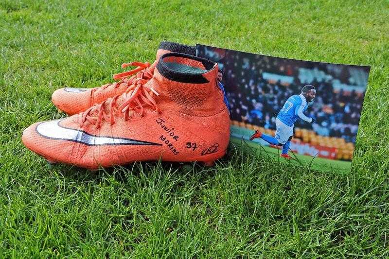 A signed pair of Junior Morias boots