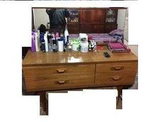 A sit-in dresser with 4 drawers and a wide mirror in very good condition.