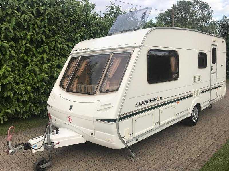 Abbey Expression 520L 4 Berth 2004 Caravan with Motor Movers and Awning