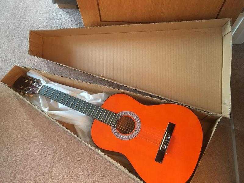 Acoustic Guitar with original box - good as new