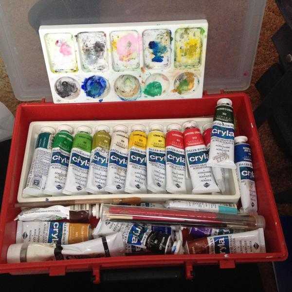 Acrylic paints collection in an Artist Box with pallet and brushes