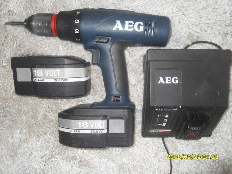 AEG 18 volt cordless heavy duty hammer drill, extra battery and charger.