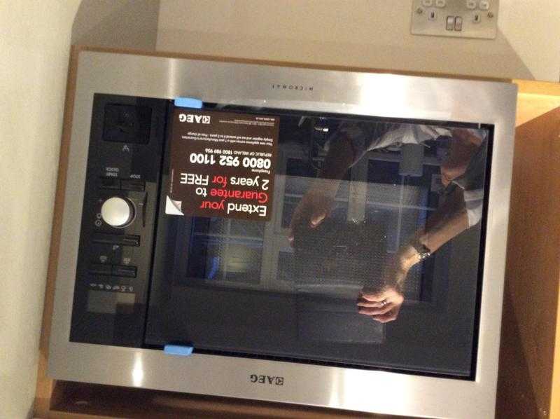 AEG microwave oven MC1753e m new with no box