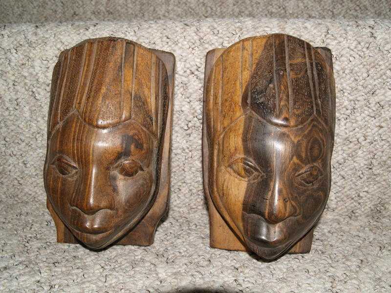 African carvings -  pair of female heads