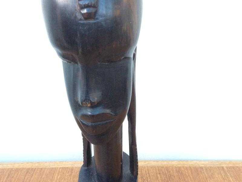 African head in black wood.