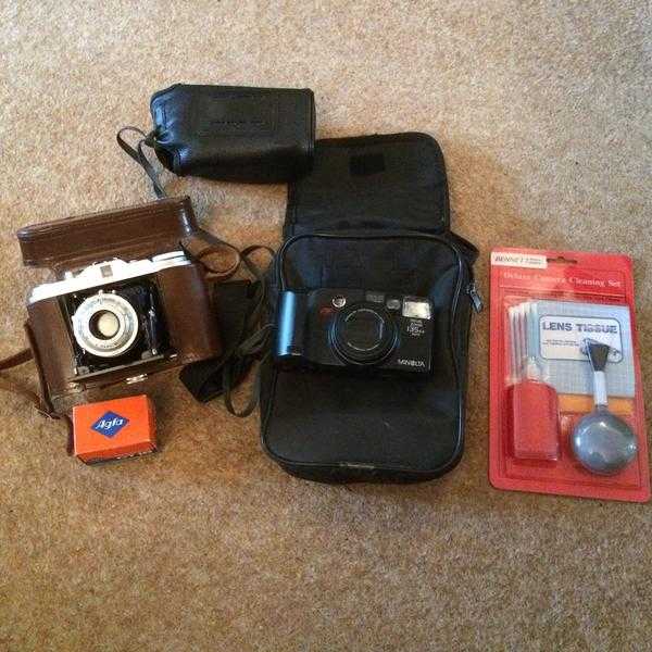 AGFA ISOLETTE amp LEATHER CASE amp MINOLTA RIVA ZOOM 135 EX CAMERAS