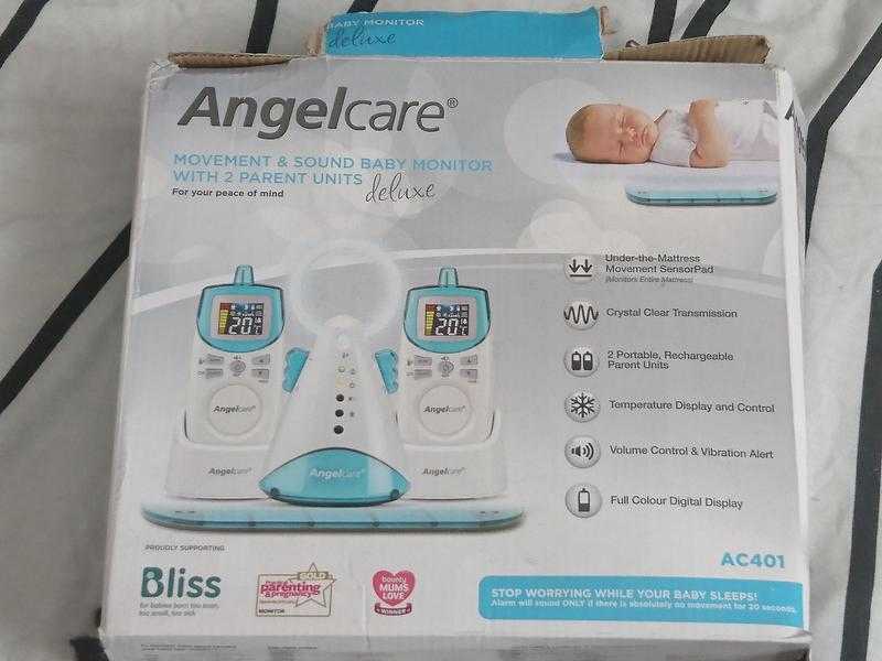 Angel care movement and sound baby monitor with two parent units.deluxe