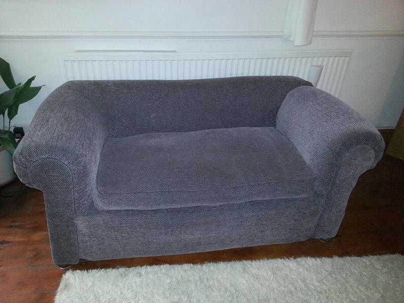 Antique Chesterfield 2 seater Sofa, drop Arm. Upholstered Heather coloured Fabric.