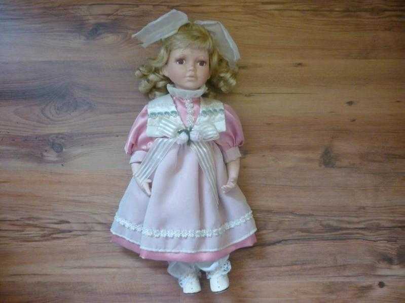 Antique Doll With Blond Curly Hair