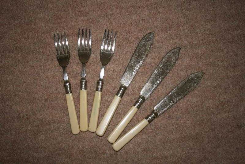 Antique fish knives and forks