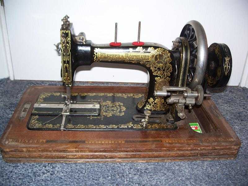 Antique Frister and Rossman Sewing Machine in wooden case-approx 1914