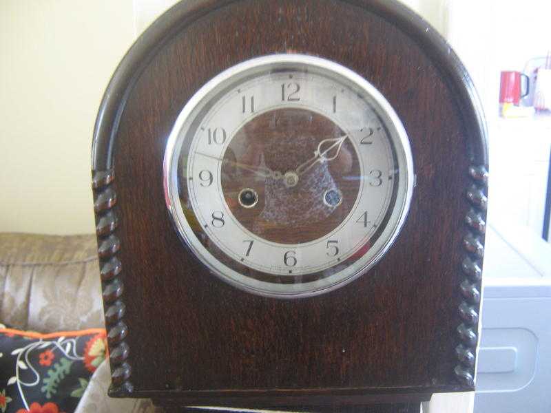 antique grandaughter clock.working