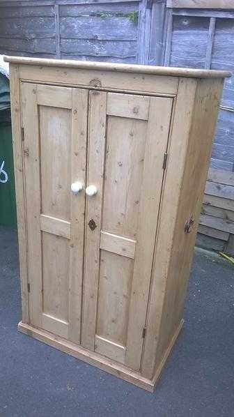 Antique pine cupboard and chest of drawers plus decorated chest of drawers and wooden chest.