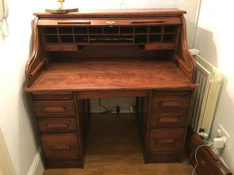 Antique roll-top oak desk