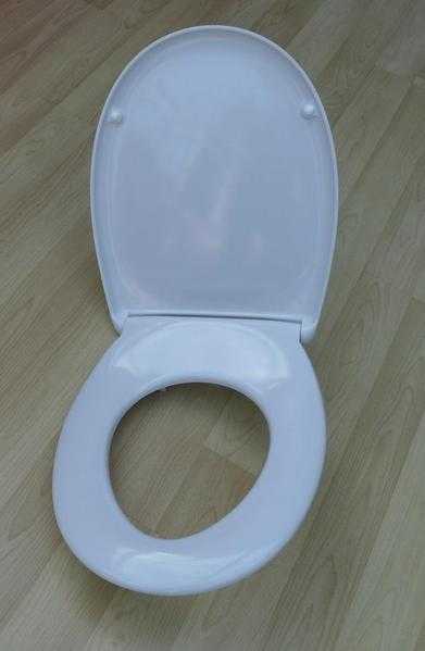 As new, soft close toilet seat