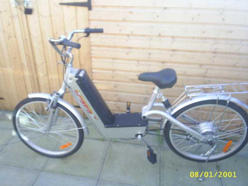 As new, unisex electric bike, comes with dynamo lights, back box and panniers if needed, amp charger.