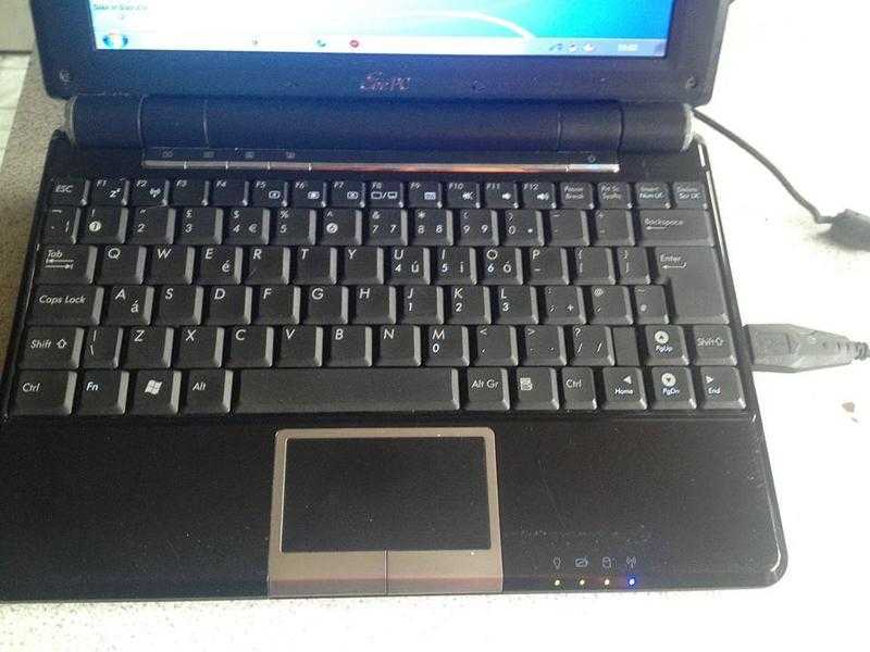 Asus Laptop on windows 7 amp 12 months security with wall charger