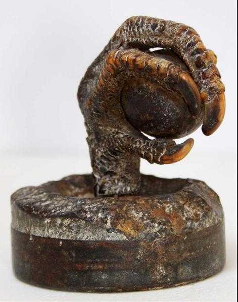 Attractive, a claw of rooster holding an iron bullet,OLD,RARE