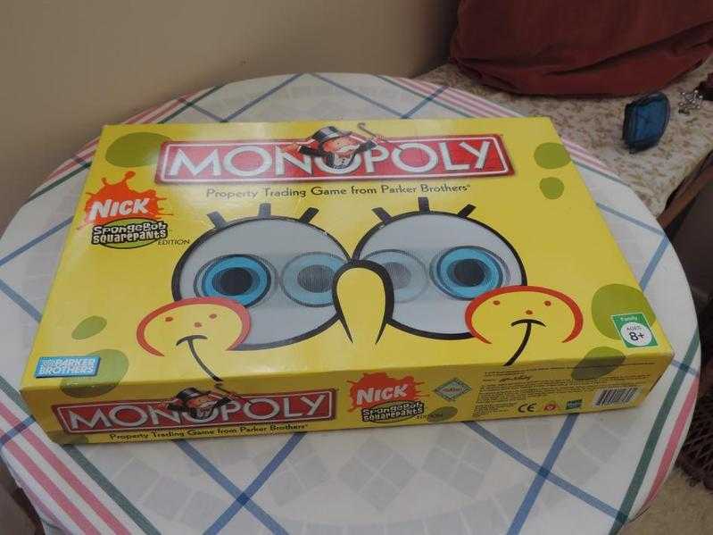 AUTHENTIC SPOGEBOB SQUARE PANTS MONOPOLY PROPERTY TRADING GAME BOXED, BOTH IN MINT AS NEW CONDITION