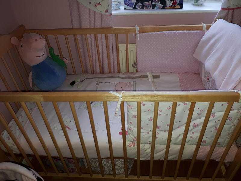 Babies Mothercare cot as new  with pink bedding as new.