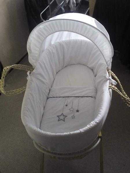 Baby moses basket and door bouncer and a baby bath seat