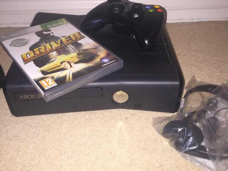 Barely used Xbox 360 250gb slim with brand new wireless controller and headset