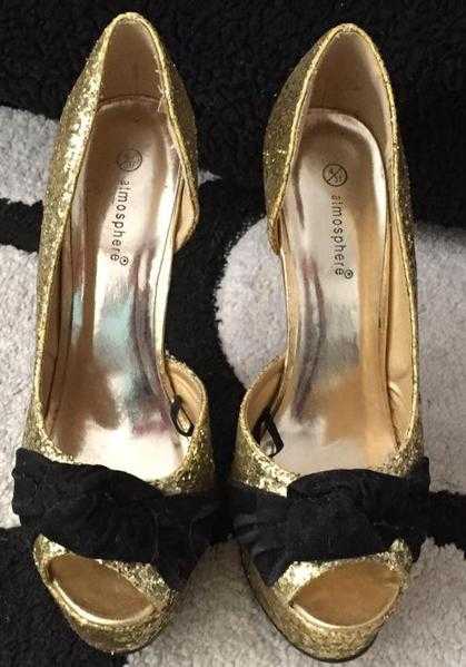 beautiful open toe gold and black shoes