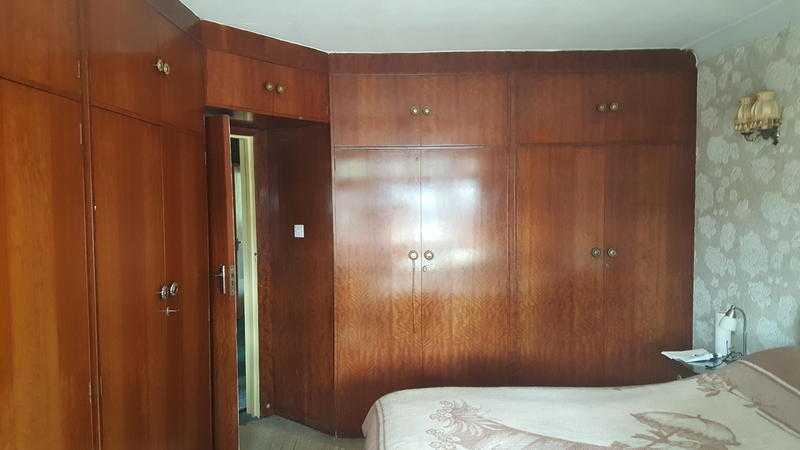 Beautiful wooden fitted wardrobes with dresser and bedside cabinets for sale.