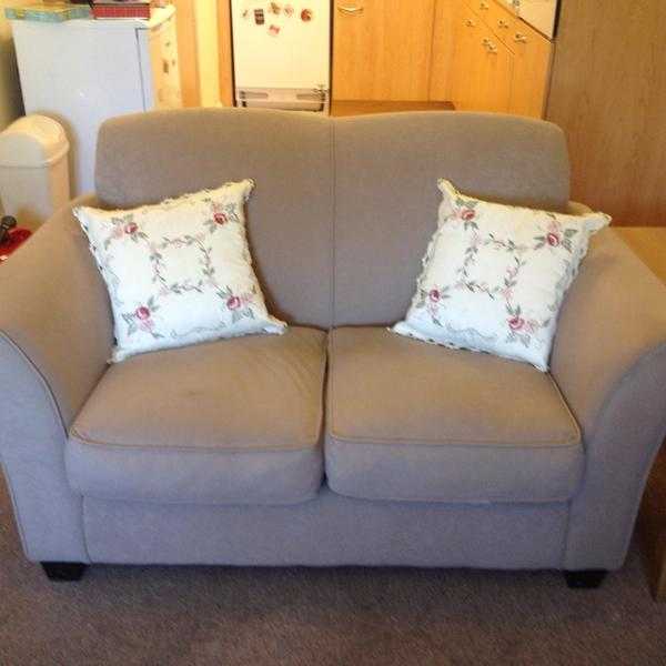 beige 2 seater sofa