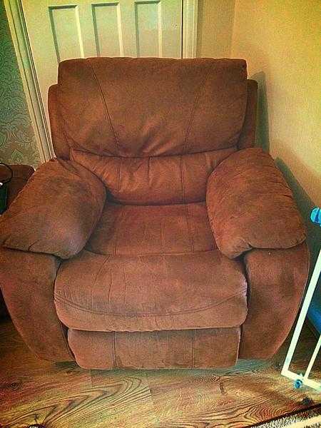 Beige sofa and chair and poof all reclining