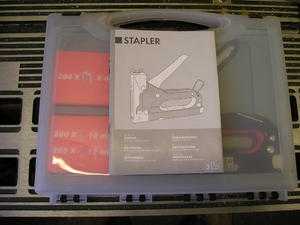 Black amp Decker Electric Stapler in metal case with staples