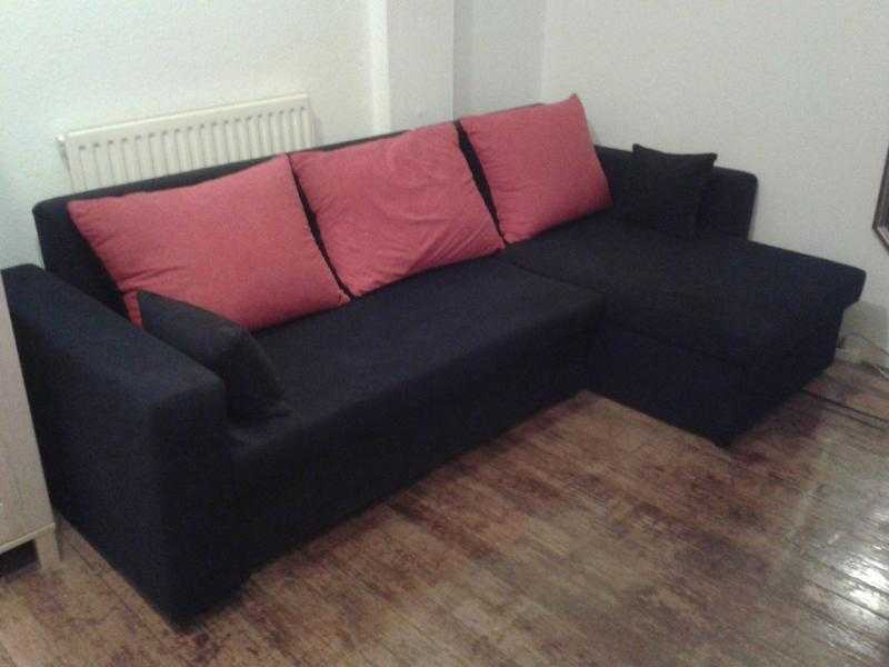 Black and red corner sofa bed