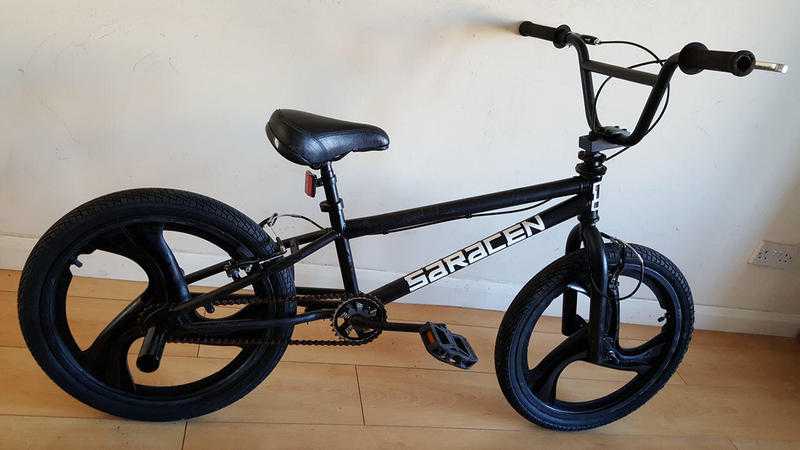 Black BMX with Mag wheels (Suit age 8 to 16 years).