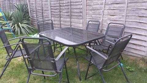 Black garden dining table and chairs