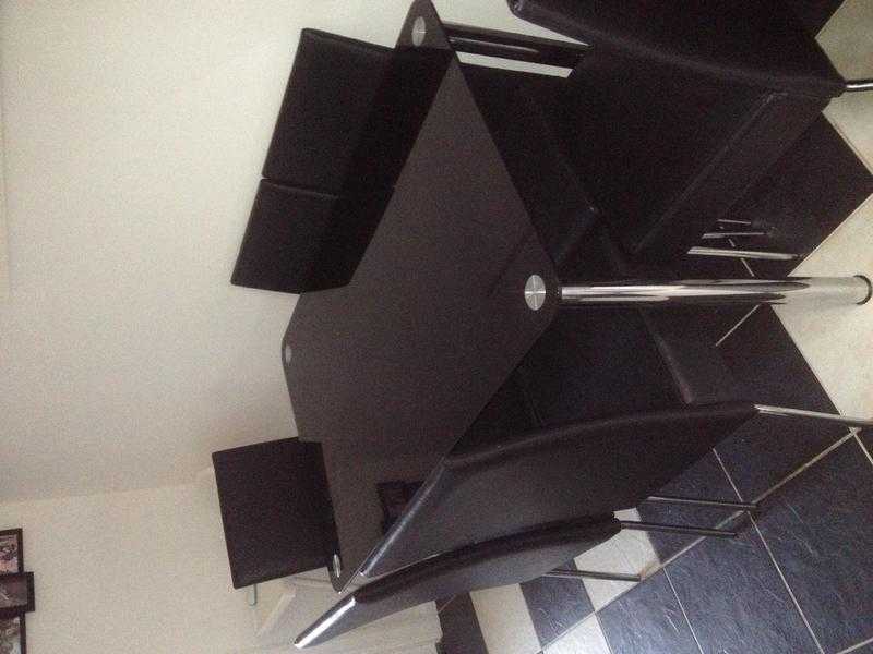 Black glass table and 6 chairs