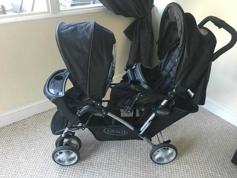 Black Graco Tandem Double Stroller in immaculate condition.