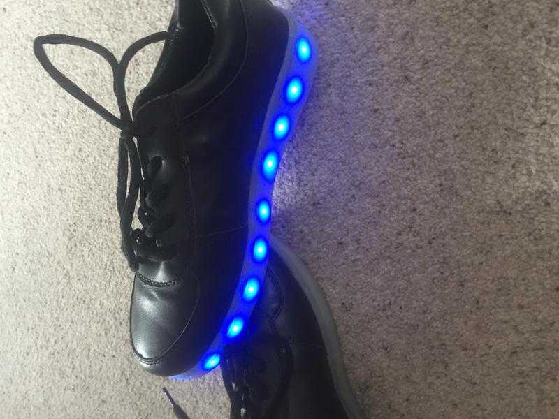 Black lace up shoes with coloured lights