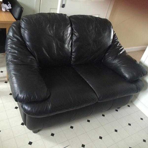 Black leather 2 seater sofa