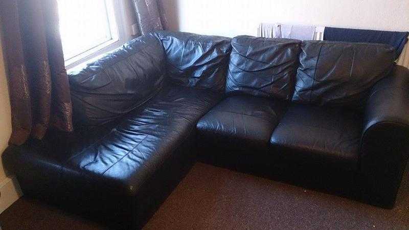 Black leather corner sofa