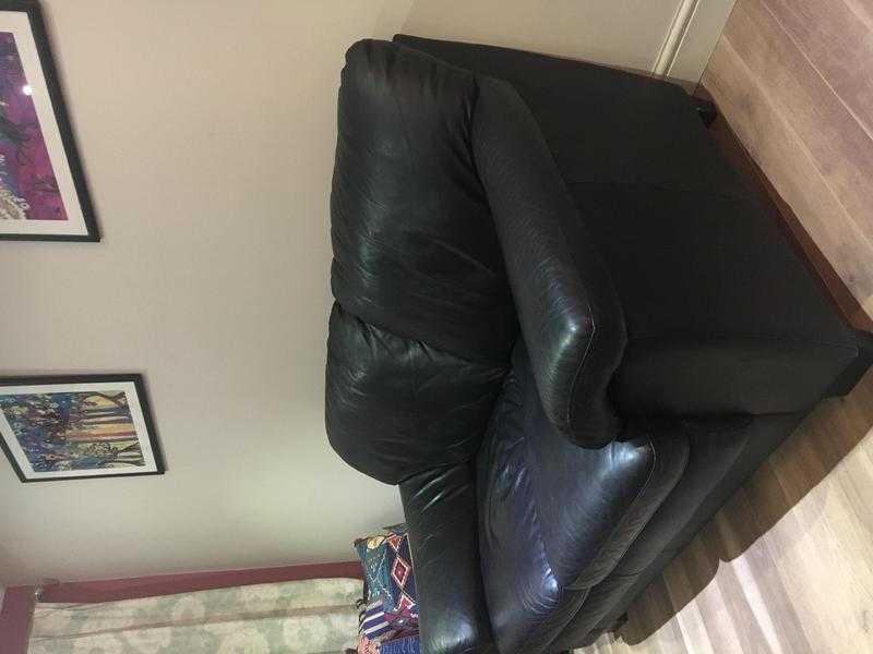 Black leather sofa - cosy and great condition