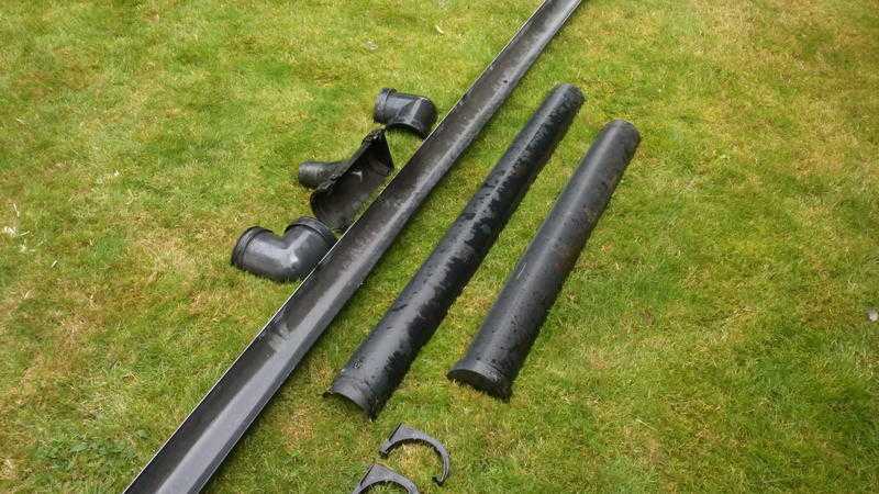 Black plastic half round guttering