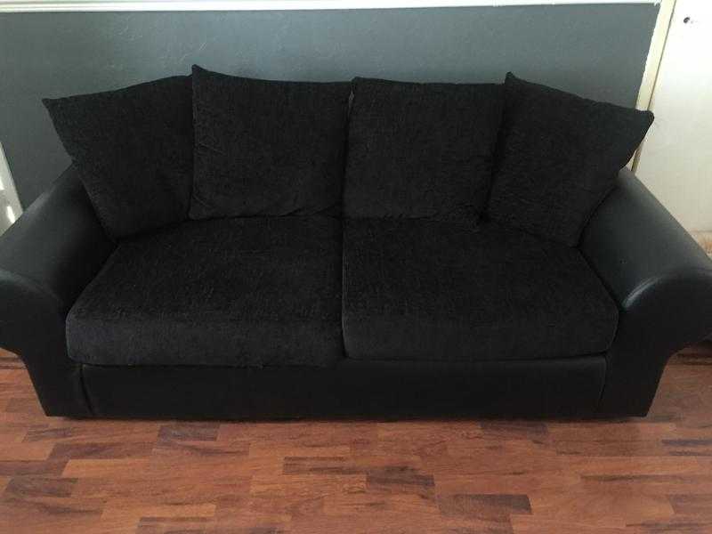 Black sofa and armchair